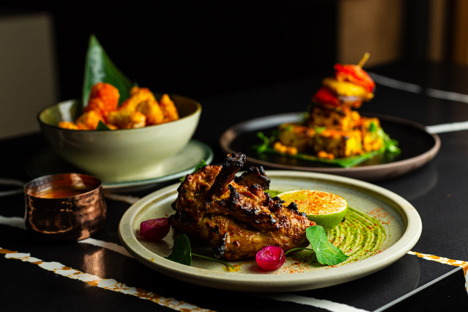 Dishes from the charcoal tandoor at Chatora City, modern Indian restaurant near Mansion House